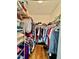 Well-organized walk-in closet with shelving and hanging space for ample storage at 8351 38Th Street E Cir # 302, Sarasota, FL 34243
