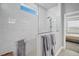 Stunning shower in a modern bathroom features a glass enclosure and sleek fixtures at 11021 Moonsail Dr, Parrish, FL 34219