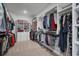 Beautiful walk-in closet with custom shelving and drawers for optimal organization at 11021 Moonsail Dr, Parrish, FL 34219