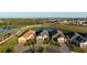 Stunning aerial view of single Gathering homes in a community surrounded by lakes at 11522 Trivio Ter, Palmetto, FL 34221