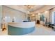 Inviting lobby area with a reception desk, comfortable seating, and stylish decor, creating a welcoming atmosphere at 11522 Trivio Ter, Palmetto, FL 34221