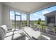 Relaxing screened patio with comfortable seating and beautiful views of the outdoor landscaping at 11522 Trivio Ter, Palmetto, FL 34221
