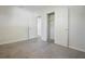 Clean bedroom with a closet and neutral walls at 124 E 119Th Ave, Tampa, FL 33612