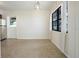 Bright dining room with a door leading to the outside at 124 E 119Th Ave, Tampa, FL 33612