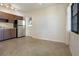 Open kitchen featuring stainless steel appliances and ample storage at 124 E 119Th Ave, Tampa, FL 33612