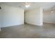 Spacious living room features neutral walls and tile flooring at 124 E 119Th Ave, Tampa, FL 33612