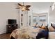 Bedroom with lake view, offering plenty of natural light and room to relax and unwind at 12420 Aster Ave, Bradenton, FL 34212