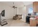 Comfortable living area with a ceiling fan and built-in desk, ideal for a home office or study space at 12420 Aster Ave, Bradenton, FL 34212