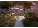 Expansive aerial view of the property showcasing the roofline, lawn, and surrounding area at 13414 Goldfinch Dr, Lakewood Ranch, FL 34202