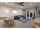 Versatile bonus room with a comfortable seating area and plenty of natural light at 13414 Goldfinch Dr, Lakewood Ranch, FL 34202