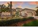 Beautiful exterior of a home featuring a well-manicured lawn, tasteful landscaping, and a two-car garage at 13414 Goldfinch Dr, Lakewood Ranch, FL 34202