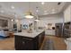 Spacious kitchen featuring a large island, modern appliances, and stylish cabinetry, perfect for cooking and entertaining at 13414 Goldfinch Dr, Lakewood Ranch, FL 34202