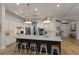 This modern kitchen features a large center island with stylish pendant lighting at 13414 Goldfinch Dr, Lakewood Ranch, FL 34202