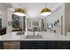 Kitchen island with a large countertop, a stainless steel dishwasher and pendant lighting at 13414 Goldfinch Dr, Lakewood Ranch, FL 34202