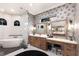 Spa-like bathroom with a soaking tub, frameless shower, and vanity at 13635 Legends Walk Ter, Lakewood Ranch, FL 34202