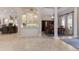 Bright dining room featuring large windows, neutral colors, and traditional furniture at 13635 Legends Walk Ter, Lakewood Ranch, FL 34202