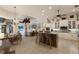 Open concept kitchen, dining, and living room area with lots of space and natural light at 13635 Legends Walk Ter, Lakewood Ranch, FL 34202