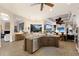 Open concept kitchen and living area with large island and stainless steel appliances at 13635 Legends Walk Ter, Lakewood Ranch, FL 34202