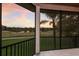 Lanai offers a beautiful, scenic view of the golf course and pond at 13635 Legends Walk Ter, Lakewood Ranch, FL 34202