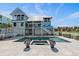 Gorgeous backyard with sparkling pool and spa, perfect for outdoor relaxation and entertainment at 137 Big Pass Ln, Sarasota, FL 34242