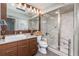Modern bathroom featuring a large glass shower, stylish vanity, and contemporary fixtures at 137 Big Pass Ln, Sarasota, FL 34242