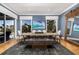 Bright dining room with beach views, a large wooden table, and comfortable seating for Gathering and guests at 137 Big Pass Ln, Sarasota, FL 34242
