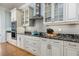 Open kitchen features granite countertops, stainless steel appliances, and modern cabinetry at 137 Big Pass Ln, Sarasota, FL 34242