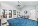 Spacious living room with vaulted ceiling, flooded with natural light, and stylish furnishings at 137 Big Pass Ln, Sarasota, FL 34242
