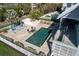 A private pool area featuring chaise lounges and an outdoor spa at 137 Big Pass Ln, Sarasota, FL 34242