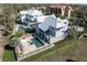 Aerial view of a pool and patio area with a privacy fence at 137 Big Pass Ln, Sarasota, FL 34242