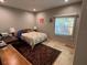 Bedroom with tile flooring, a window, and neutral paint at 1534 25Th St, Sarasota, FL 34234