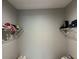 Spacious walk-in closet with wire shelving for ample storage space at 1534 25Th St, Sarasota, FL 34234