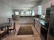 Open-concept kitchen seamlessly flowing into a comfortable living area and dining space at 1534 25Th St, Sarasota, FL 34234