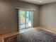 Living room featuring sliding glass doors to an outdoor patio at 1534 25Th St, Sarasota, FL 34234