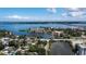 Breathtaking aerial view of waterfront buildings and bridge, set against a blue sky at 1704 Ballard Park Dr, Bradenton, FL 34205