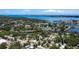 Aerial view showcases this property's prime location near a scenic body of water and surrounding neighborhood at 1704 Ballard Park Dr, Bradenton, FL 34205