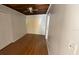 Bedroom featuring ceiling fan, wood flooring, and lots of natural light at 1704 Ballard Park Dr, Bradenton, FL 34205