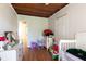 Bedroom featuring ceiling fan, wood flooring, and lots of natural light at 1704 Ballard Park Dr, Bradenton, FL 34205