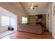 Cozy living room with a vaulted ceiling, fireplace and comfortable seating at 1704 Ballard Park Dr, Bradenton, FL 34205
