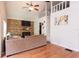 Comfortable living room with vaulted ceiling, a fireplace, and access to a loft area at 1704 Ballard Park Dr, Bradenton, FL 34205