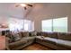 Spacious living room with comfortable seating, hardwood floors, and a bright, open feel at 1704 Ballard Park Dr, Bradenton, FL 34205