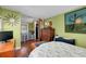 Bright bedroom with window nook, hardwood floors, and unique decor at 1739 Oak St, Sarasota, FL 34236