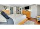 Bright bedroom features an area rug, neutral walls, and light wood furnishings at 1739 Oak St, Sarasota, FL 34236