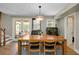 This dining room provides access to natural light and has space for six people at the table at 1739 Oak St, Sarasota, FL 34236