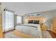 Well-lit main bedroom with bright decor, a large rug, and big windows at 1739 Oak St, Sarasota, FL 34236
