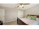 Comfortable bedroom featuring wood flooring and a ceiling fan at 17440 Hampton Falls Ter, Bradenton, FL 34202