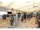 Spacious fitness center with state-of-the-art equipment and ample natural light for an energizing workout at 17440 Hampton Falls Ter, Bradenton, FL 34202