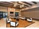 Upscale lounge area with chic furnishings, modern lighting, and ample space for socializing and relaxation at 17440 Hampton Falls Ter, Bradenton, FL 34202