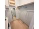 Walk-in closet offering shelves, hanging rods, mirror and storage space at 182 Pineneedle Dr # 182, Bradenton, FL 34210