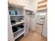 Walk-in closet offering shelves, hanging rods and storage space at 182 Pineneedle Dr # 182, Bradenton, FL 34210